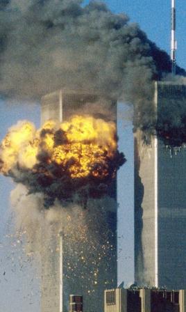The iconic twin towers in flames after attack by terrorists - the first such on US soil, killing more than three thousand.