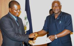 The ACC boss and the President - Photo: AWOKO
