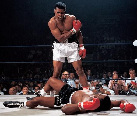 One of the most iconic photographs in the world of boxing. Sonny Liston floored by the Louiseville Lip in the 60's.