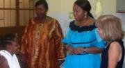 Mrs Sia Koroma, wife of the President (in brown) visits a clinic