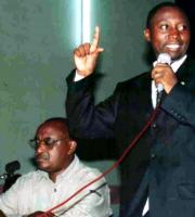 The murdered man Andre Kagwa Rwisereka is seen seated at a Green Party meeting.