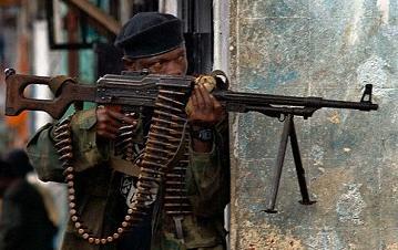 This is a Charles Taylor fighter. This heavy machine gun is a part of the arms consignment bought for the APC police - Photo: UK Daily Mail