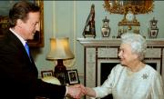 The UK's new Prime Minister Dvid Cameron with Her Majesty the Queen