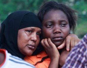 Shaken students who survived the slaughter.