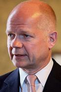 UK Foreign Minister William Hague insists the UK government does not believe in military interventions to support democracy but insists that political leaders must find a way to resolve the impasse.