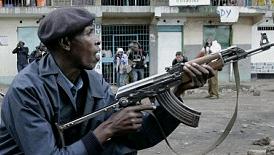 Kenya policeman in battle-ready firing position during 2007 unrest