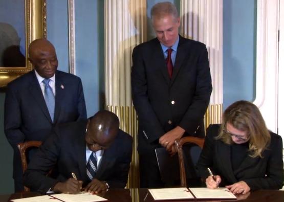 The signing of the Liberia protocol.