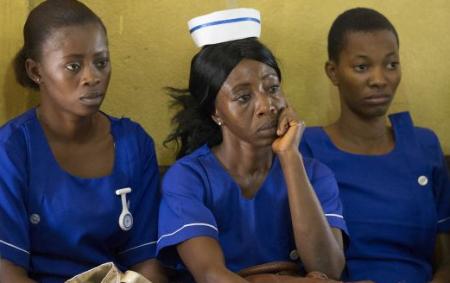 The faces tell the story. It is not an easy and comforting task tackling Ebola but these brave people soldier on nevertheless. We salute all of them.