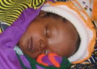 A baby sleeping at the Panguma hospital