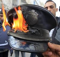 A symbol of repression in a police state set on fire in Tunisia. Is Ernest Bai Koroma watching?