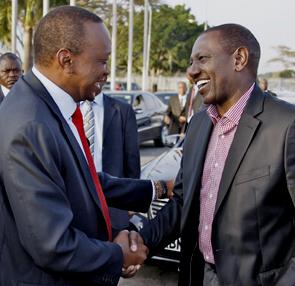 Uhuru the lying jackal in a handshake with another ICC accused wretch William Ruto before leaving for Saturday's meeting at the African Union in Addis Ababa.